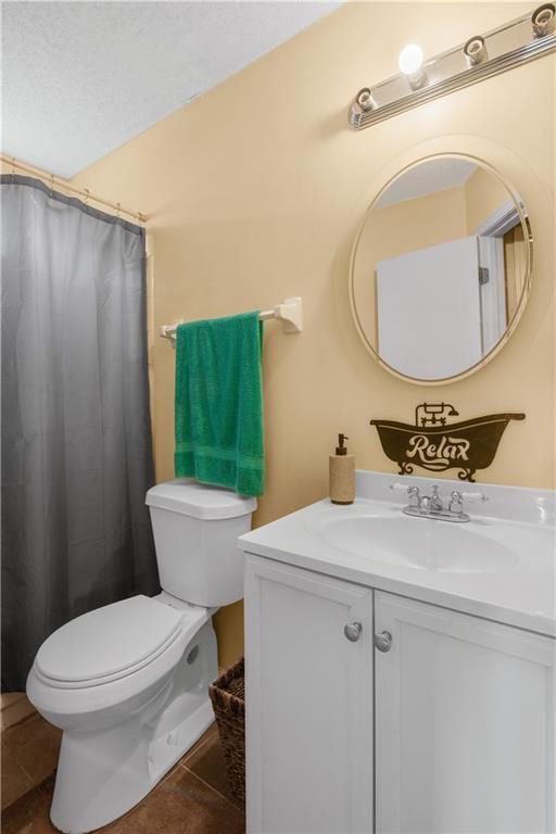 9760 Loblolly Ln, Roswell, GA 30075 - bathroom with vanity, toilet, a shower with shower curtain, and tile patterned floors