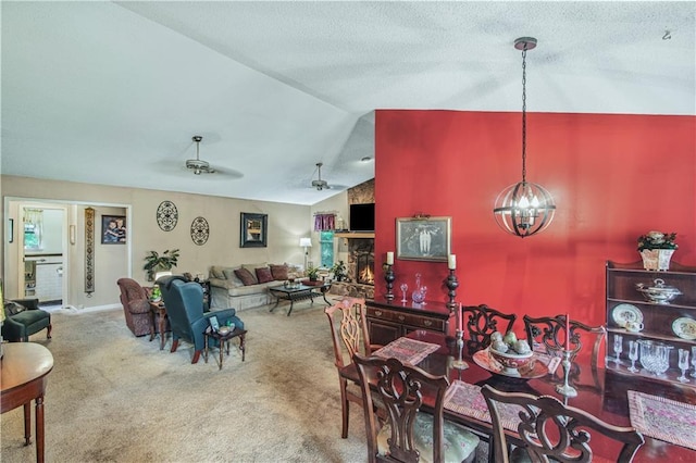 9760 Loblolly Ln, Roswell, GA 30075 - carpeted dining space featuring vaulted ceiling and a chandelier
