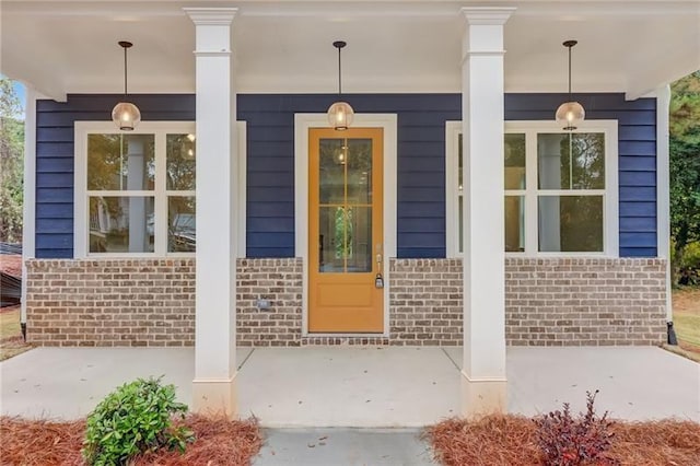 property entrance with a porch