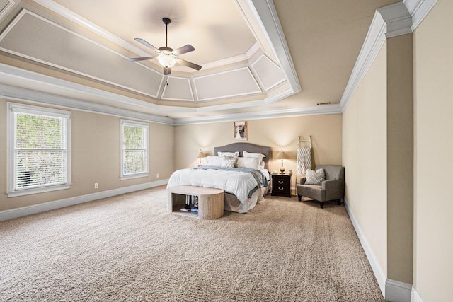 bedroom with baseboards, crown molding, and carpet flooring