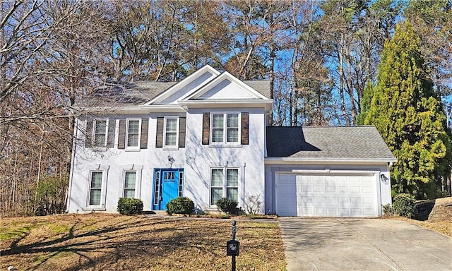 view of front of property featuring a garage