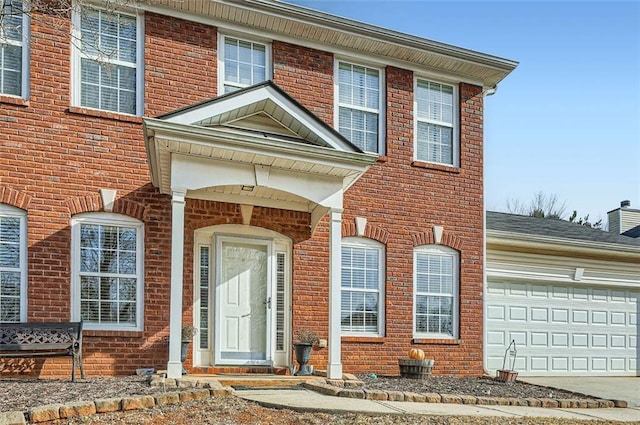 view of front of property featuring a garage