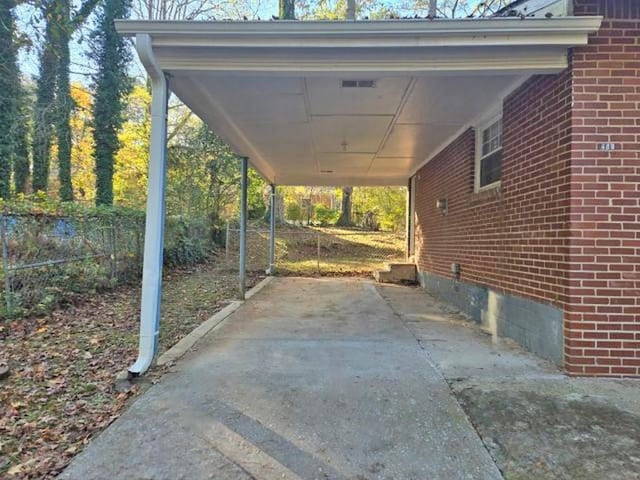 view of car parking featuring a carport