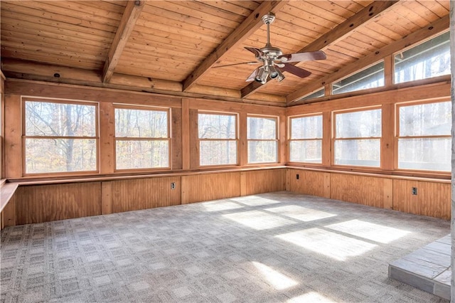 unfurnished sunroom with wooden ceiling, ceiling fan, and lofted ceiling with beams