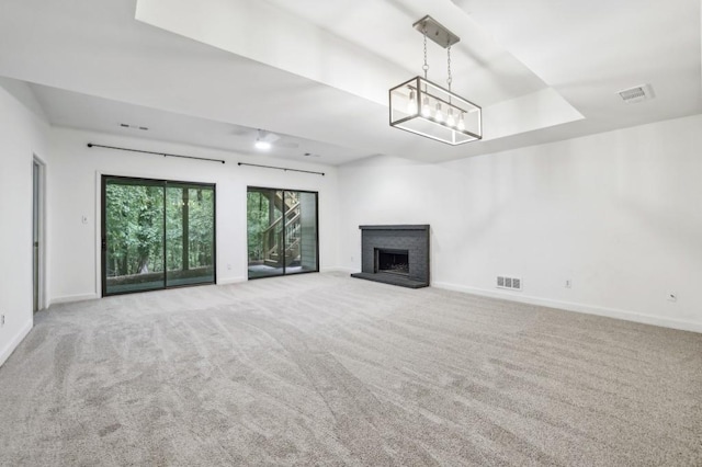 unfurnished living room with baseboards and carpet floors