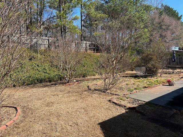 view of yard featuring fence