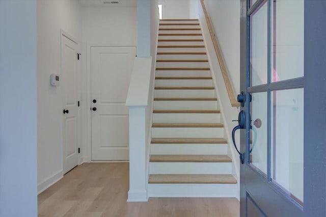1919 Deco Dr, Kennesaw, GA 30144 - staircase featuring wood finished floors and plenty of natural light