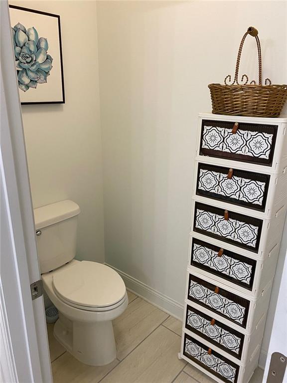 bathroom featuring toilet