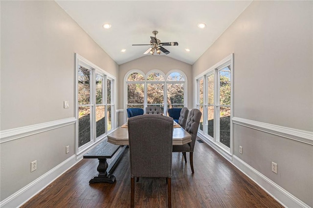 dining space featuring lofted ceiling, recessed lighting, dark wood-style floors, and baseboards