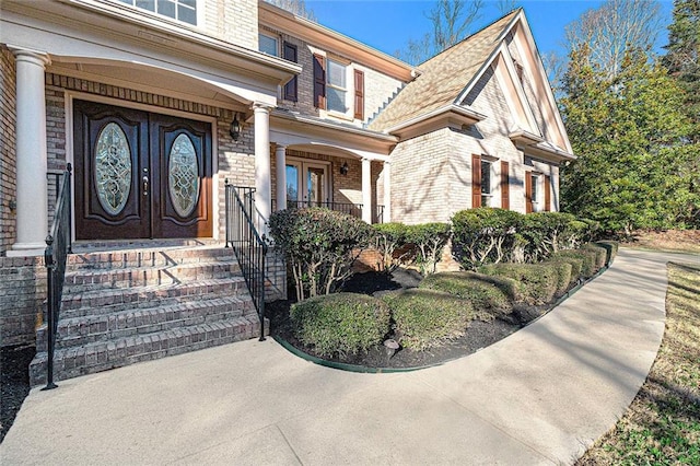 doorway to property featuring a porch