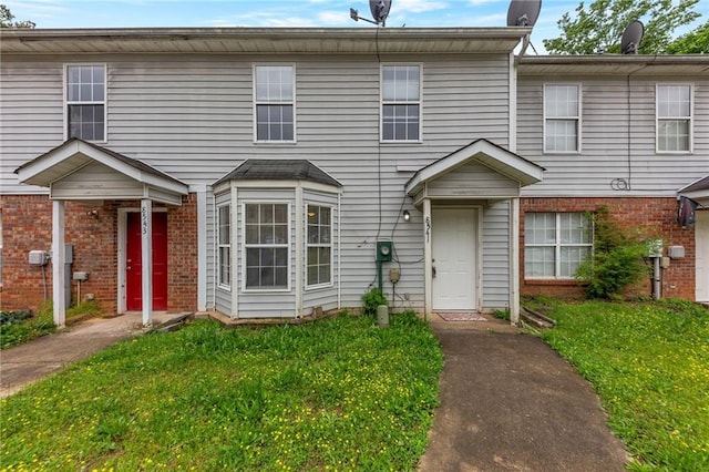 8541 Westchester Dr, Douglasville, GA 30134 - multi unit property featuring a front yard and brick siding