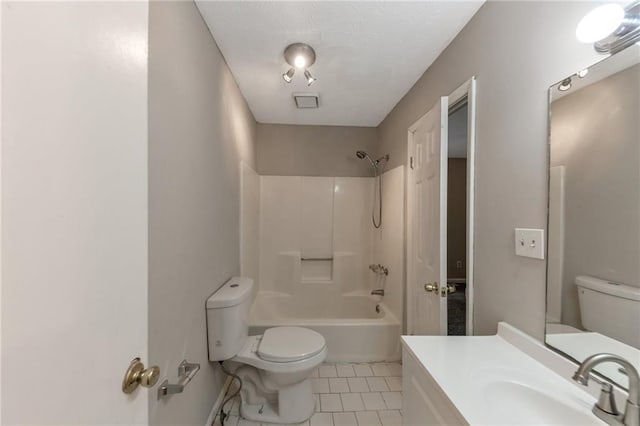 8541 Westchester Dr, Douglasville, GA 30134 - full bathroom with toilet, tile patterned flooring, vanity, and shower / washtub combination