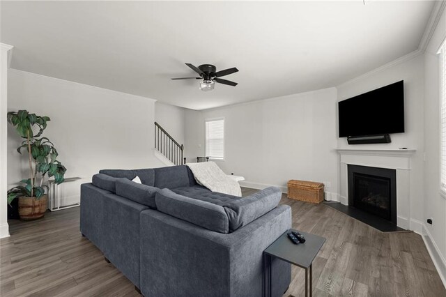 bedroom with ceiling fan and light carpet