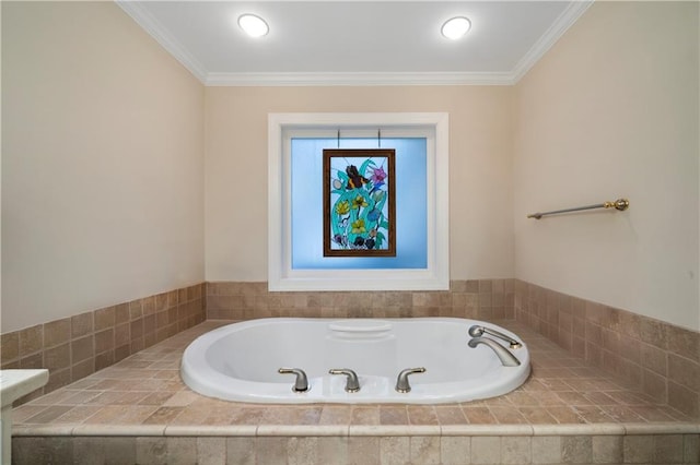 bathroom with tiled tub and ornamental molding