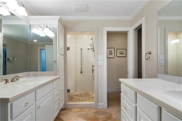 bathroom with vanity, tile patterned flooring, crown molding, and a shower