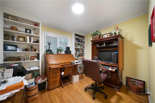 office space featuring crown molding and light hardwood / wood-style flooring