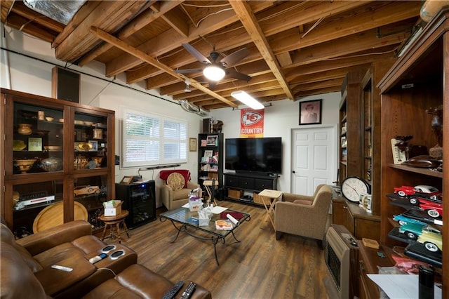 living room with hardwood / wood-style flooring and heating unit