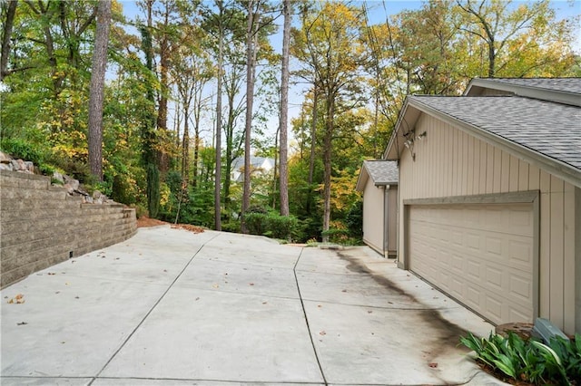 exterior space with a garage