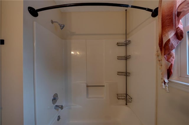 bathroom with shower / washtub combination