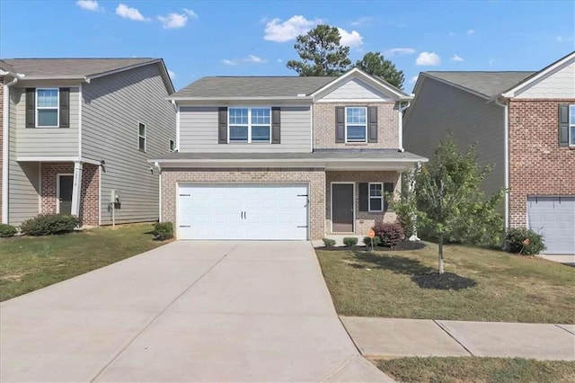 view of front of property featuring a garage and a front yard