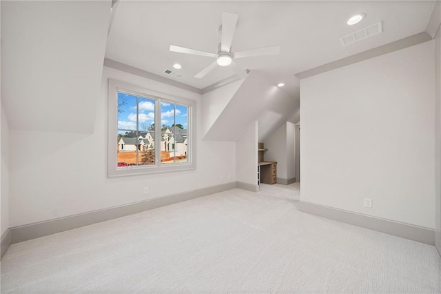 bonus room featuring carpet floors, ceiling fan, visible vents, and vaulted ceiling