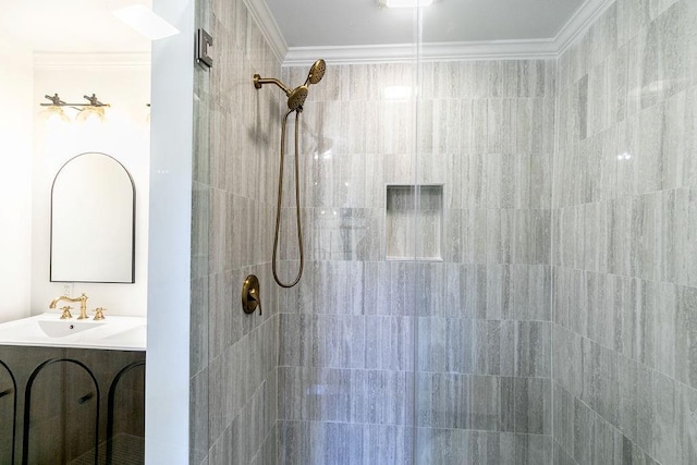 bathroom with crown molding and tiled shower