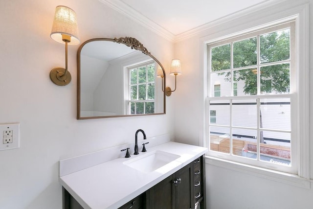 bathroom with vanity and ornamental molding
