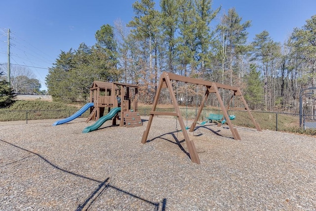 communal playground featuring fence