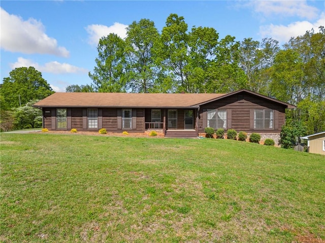 single story home with a front yard