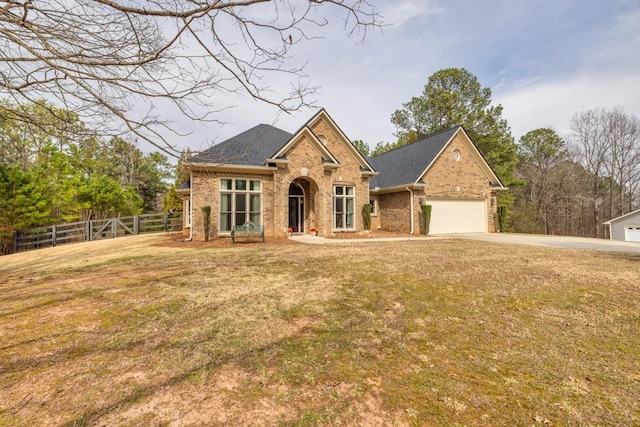 2915 Pruitt Rd, Cumming, GA 30041 - traditional-style home featuring brick siding, driveway, and an attached garage