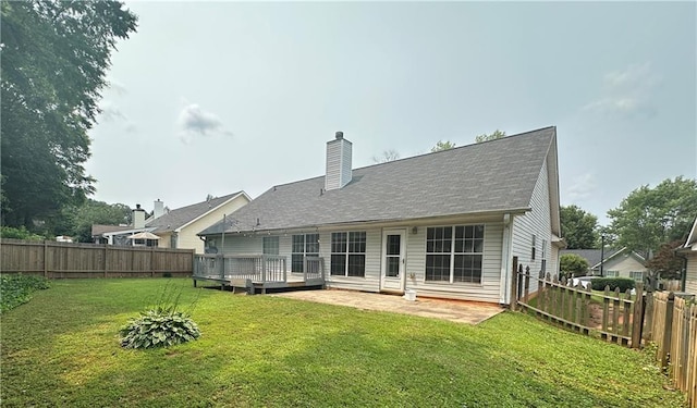 3718 Jackson Bluff Dr, Lawrenceville, GA 30044 - rear view of house featuring a fenced backyard, a wooden deck, and a chimney