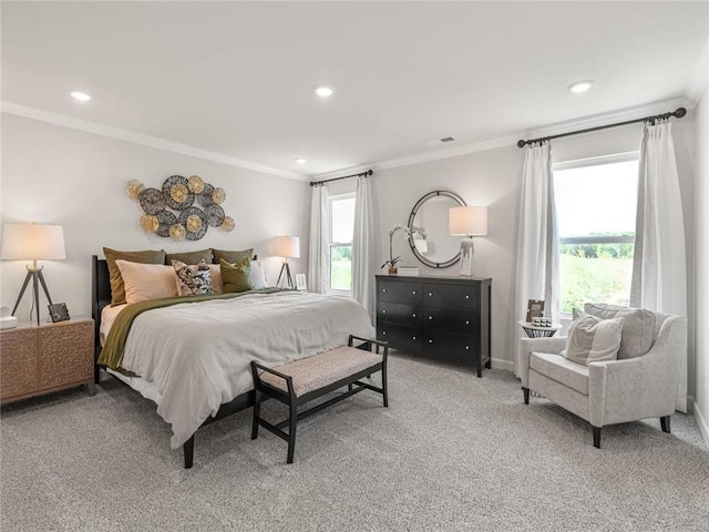 bedroom featuring baseboards, recessed lighting, ornamental molding, and light colored carpet