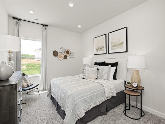 bedroom with recessed lighting, visible vents, carpet flooring, and baseboards