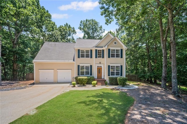 405 Sable Ct, Milton, GA 30004 - colonial house featuring driveway, an attached garage, and a shingled roof