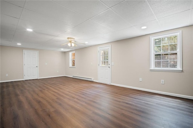 405 Sable Ct, Milton, GA 30004 - spare room featuring a baseboard radiator, dark wood finished floors, a ceiling fan, and recessed lighting
