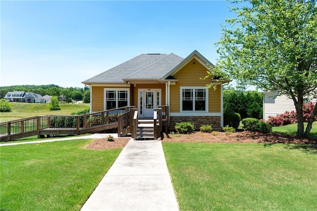 238 Lighthouse Cv SW, Adairsville, GA 30103 - bungalow-style home with a front yard and a deck