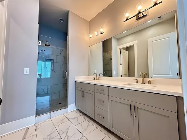 bathroom with vanity and a shower with door