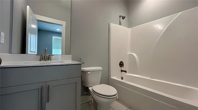 full bathroom with toilet, tile patterned floors, vanity, and bathing tub / shower combination