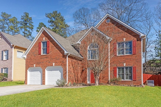 traditional-style home featuring brick siding, driveway, a front lawn, and central air condition unit