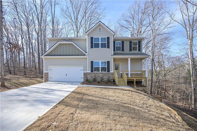 view of front of house featuring a garage and a porch