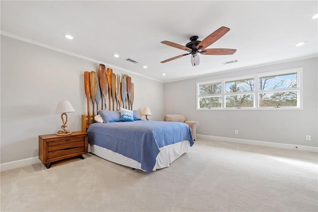 bedroom featuring ceiling fan, light colored carpet, and crown molding