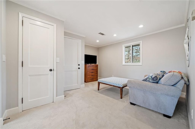 living room with ornamental molding and light colored carpet