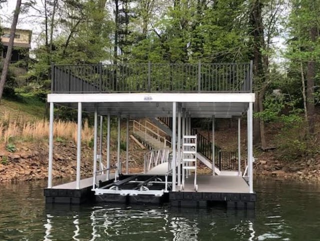 view of dock with a water view