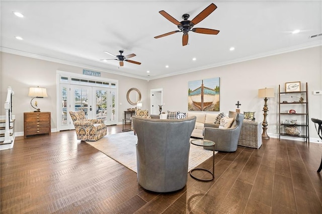 living room with ceiling fan, dark hardwood / wood-style flooring, french doors, and crown molding