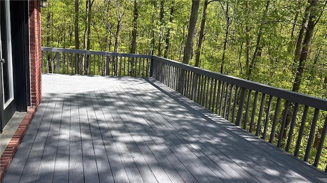 225 Austin Oaks Dr SE, Ellenwood, GA 30294 - wooden deck featuring a wooded view