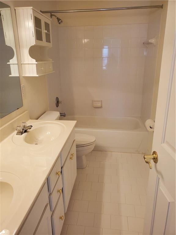 4217 Mill Grove Ln SW, Smyrna, GA 30082 - bathroom featuring toilet, bathing tub / shower combination, double vanity, and tile patterned flooring