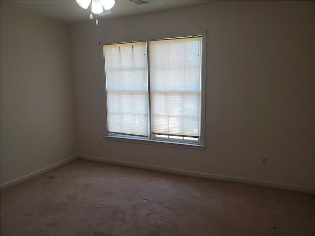 4217 Mill Grove Ln SW, Smyrna, GA 30082 - empty room with carpet flooring, baseboards, and a ceiling fan