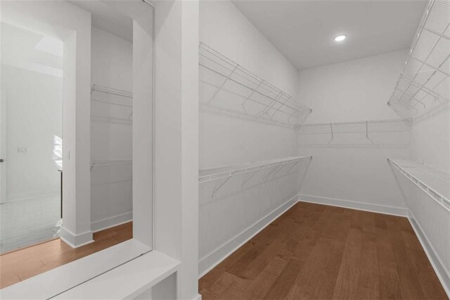 2023 Fern Mountain Ln, Marietta, GA 30064 - spacious closet featuring wood finished floors