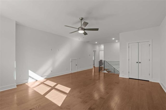 2023 Fern Mountain Ln, Marietta, GA 30064 - unfurnished living room featuring baseboards, a ceiling fan, wood finished floors, and recessed lighting