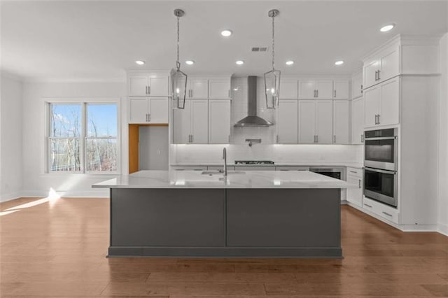 2023 Fern Mountain Ln, Marietta, GA 30064 - kitchen featuring a sink, double oven, stovetop, white cabinets, and wall chimney exhaust hood